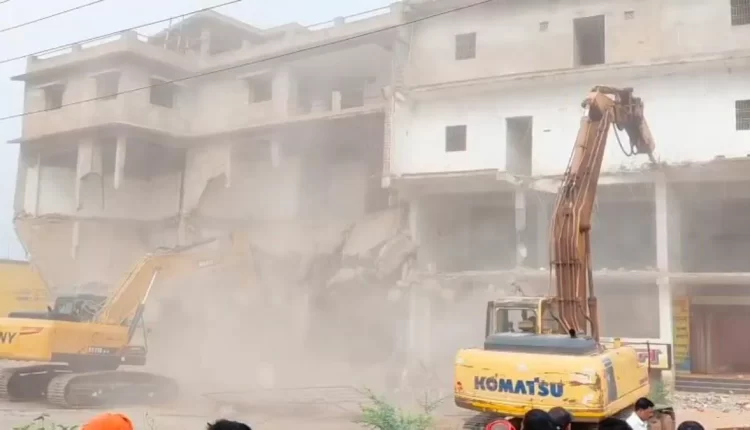 bulldozer ran on luxurious houses